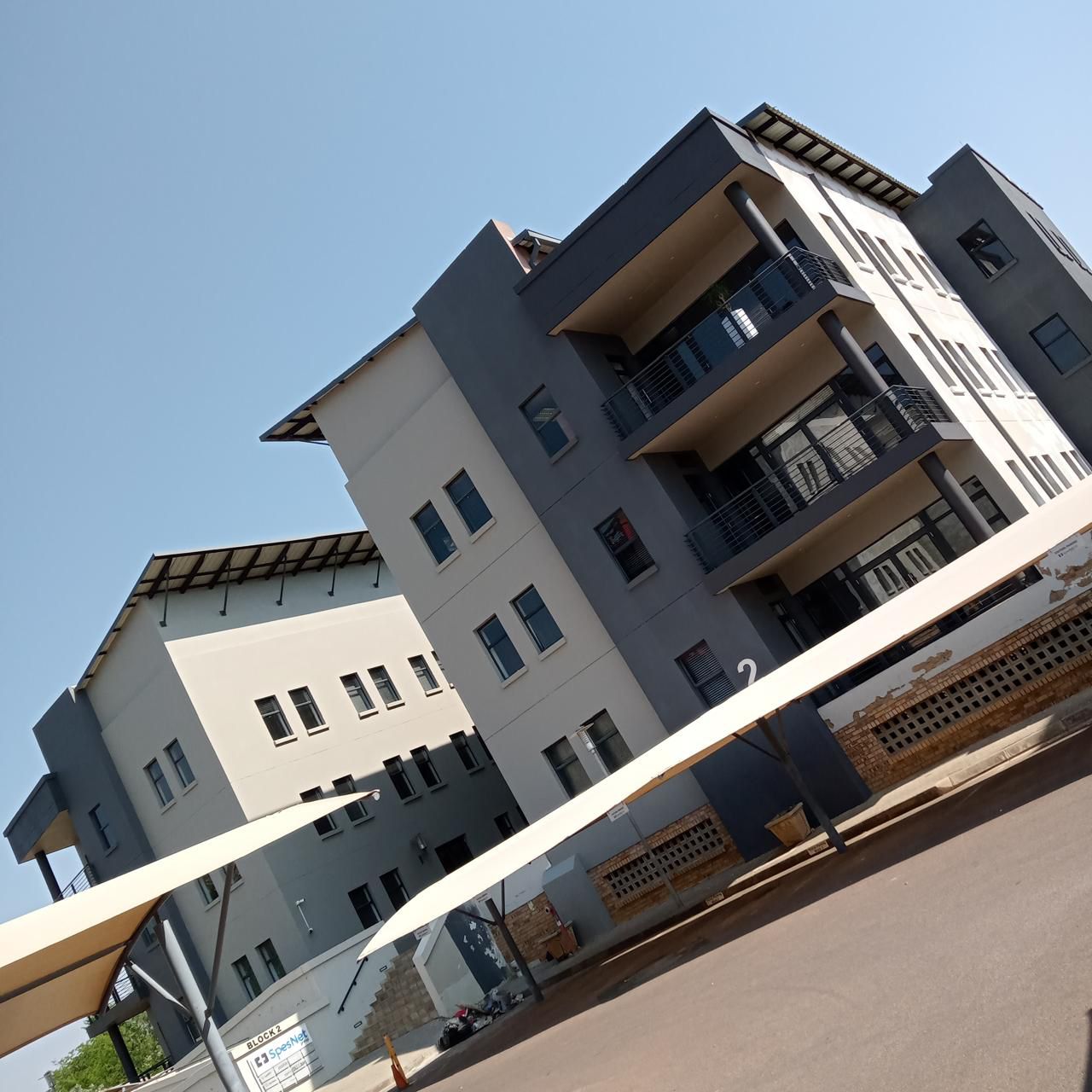 Rope access painting completed commercial block Sandton Johannesburg