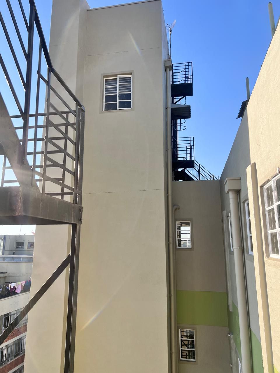 Rope access painters Sandton narrow building shaft completed body corporate