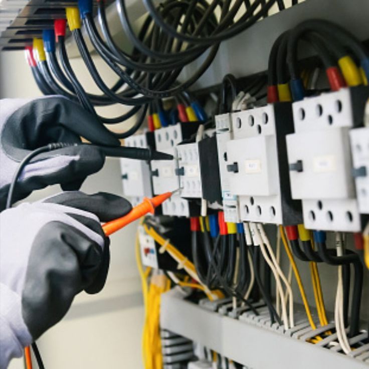 Electrician testing DB board critical circuits